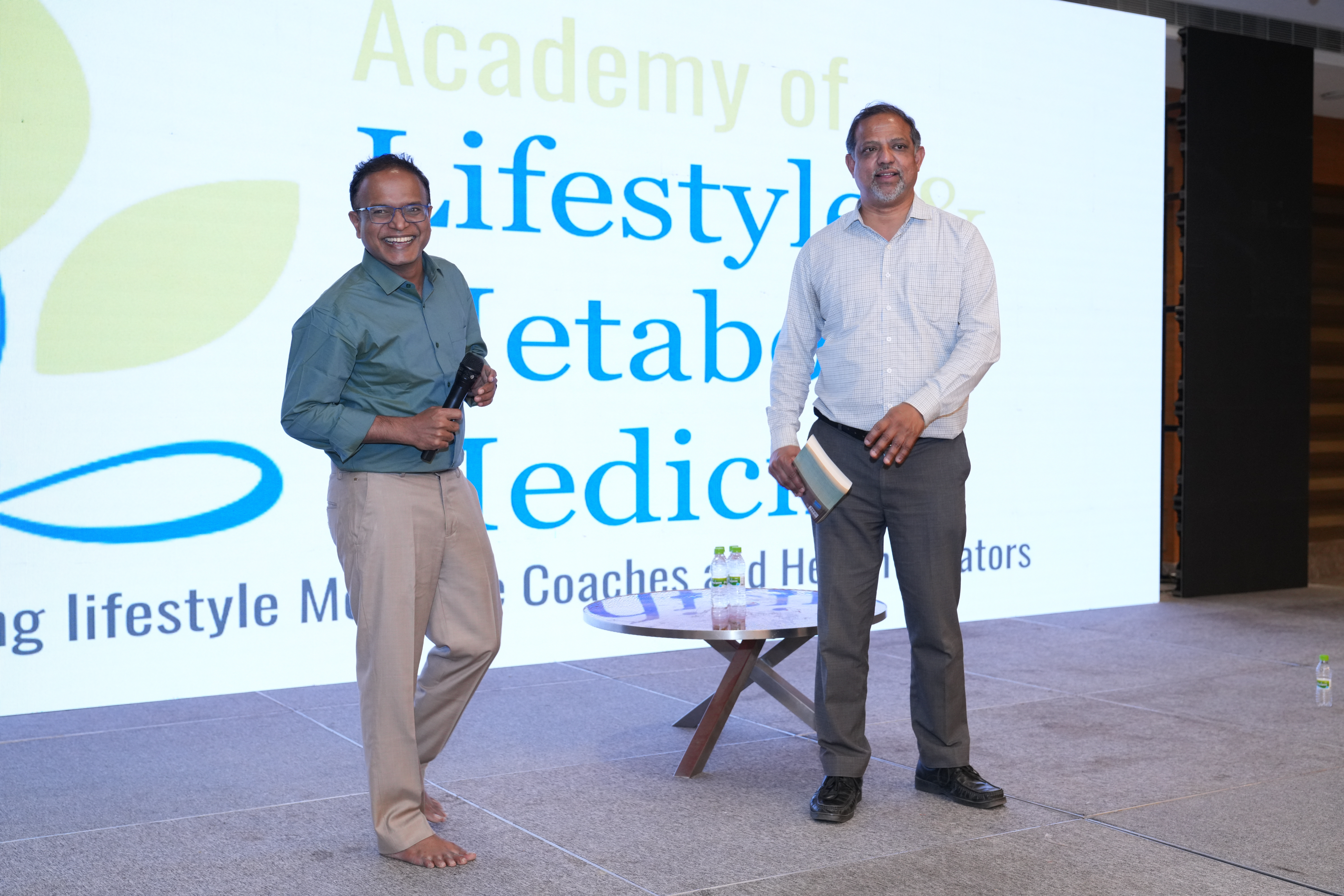 On stage leading the Academy of Lifestyle & Metabolic Medicine